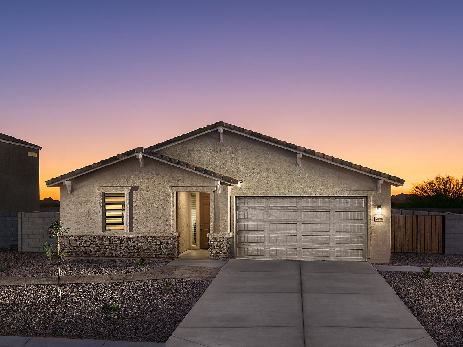 Single-story stucco house with two-car garage
