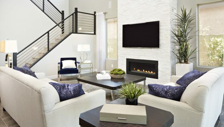 Two story ceilings soar above great room